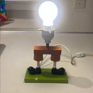 SpongeBob SquarePants lamp without shade. The lamp has damage on the base.